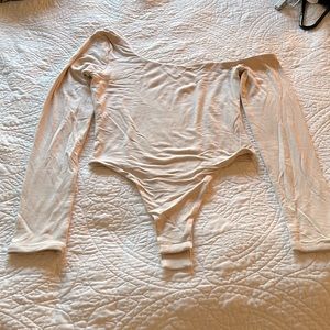 One shoulder cream bodysuit
